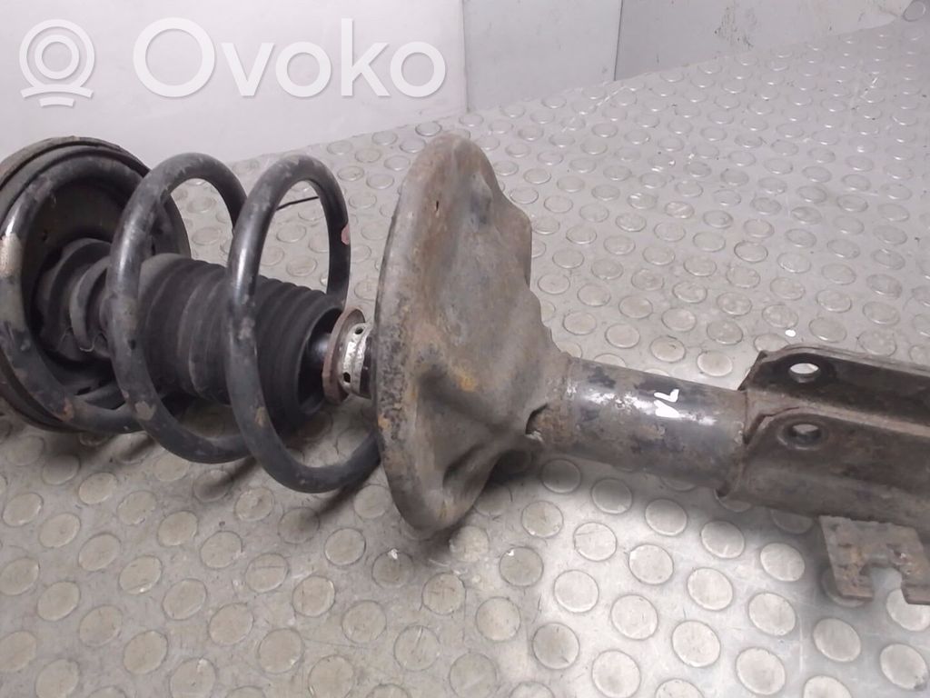 Mazda 323 Priekšpusē amortizators ar atsperi 
