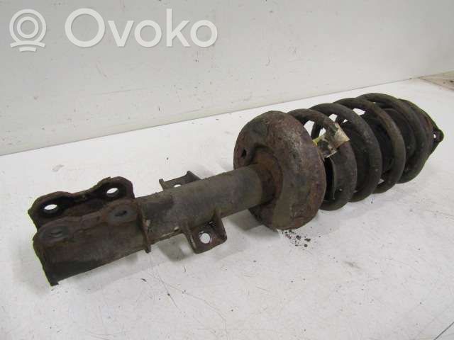 Front shock absorber with coil spring