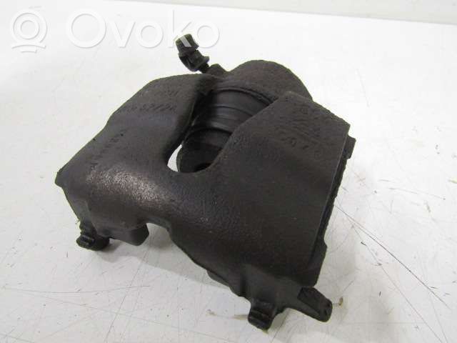 Opel Astra G Zacisk hamulcowy przedni 