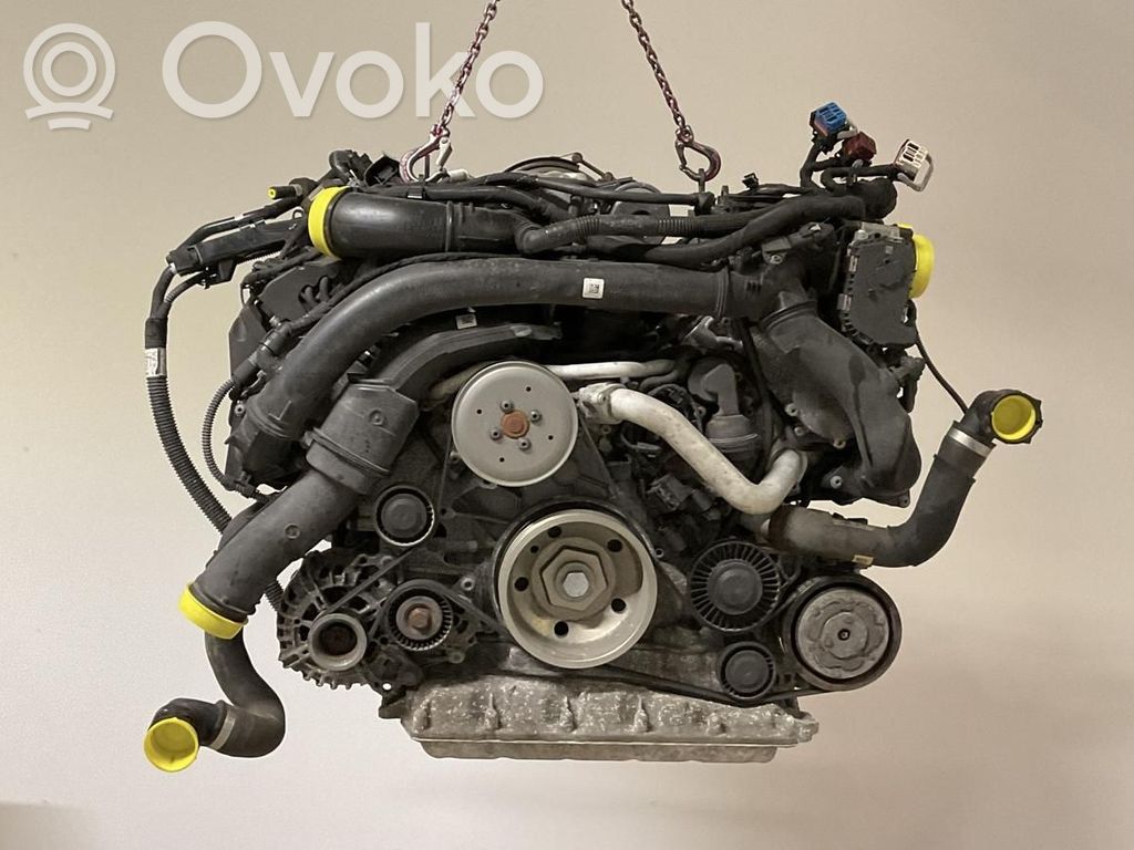 Двигатель   06M100031L,06M100031F