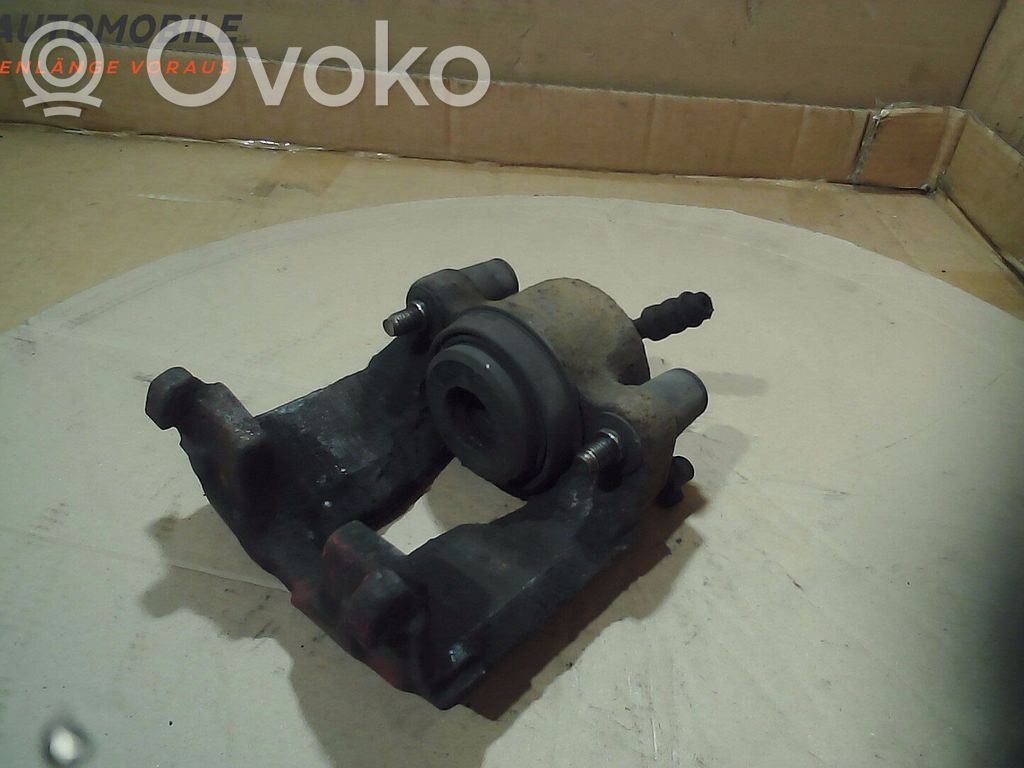 Opel Astra G Zacisk hamulcowy przedni 
