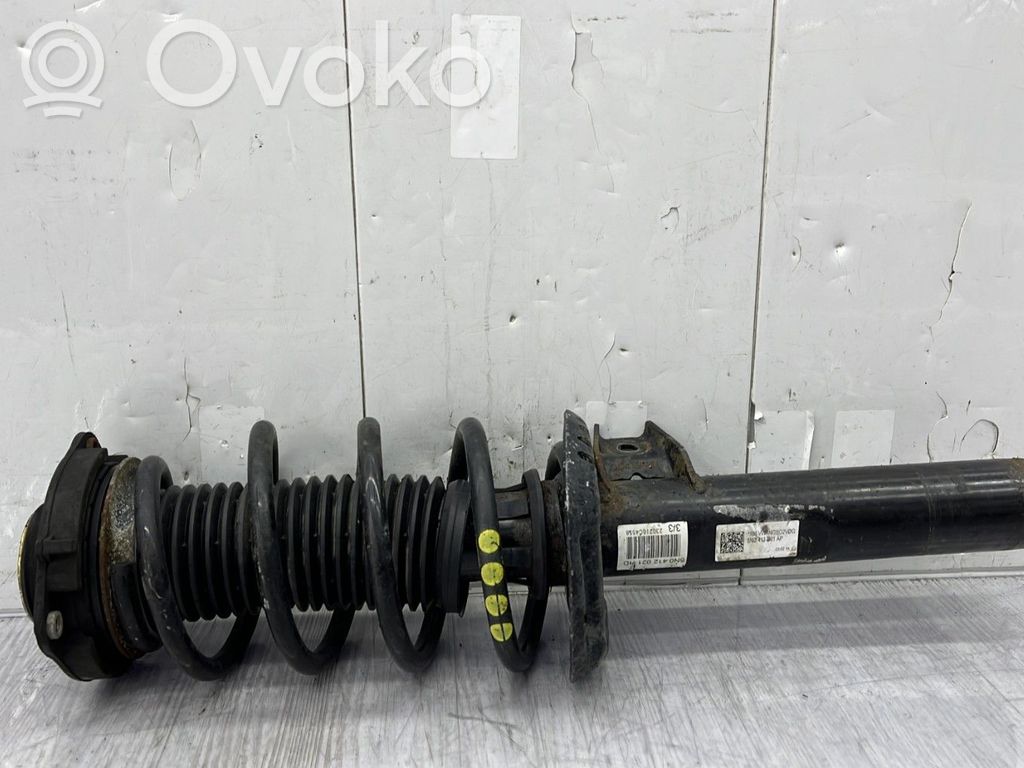 Volkswagen Tiguan Front shock absorber with coil spring 