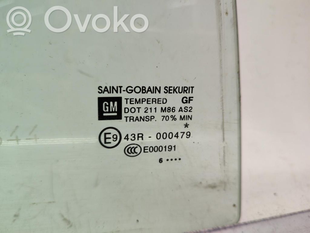 Opel Corsa D Ventanilla de ventilación de la puerta trasera 
