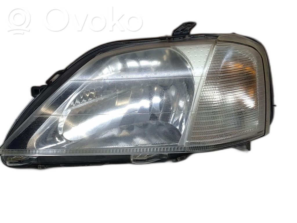 Dacia Logan I Lampa przednia 