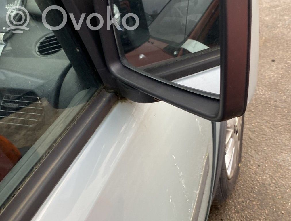 Opel Combo C Oglindă exterioară manuală 