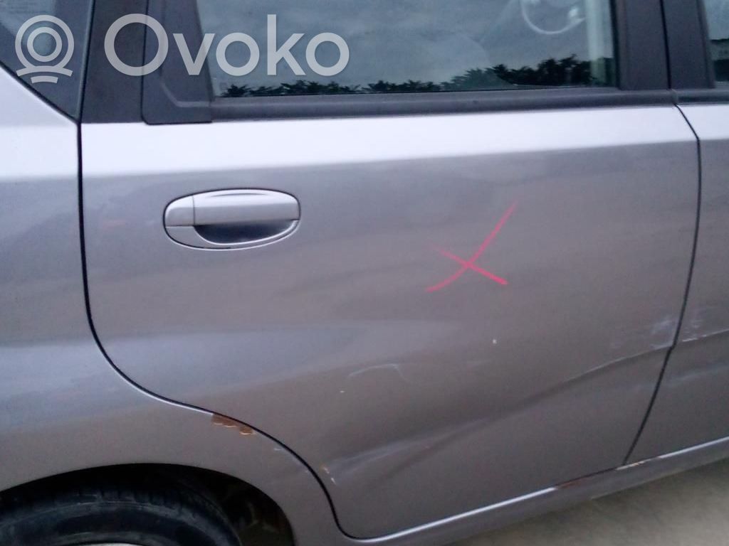 Chevrolet Aveo Regulador manual de la ventanilla trasera 