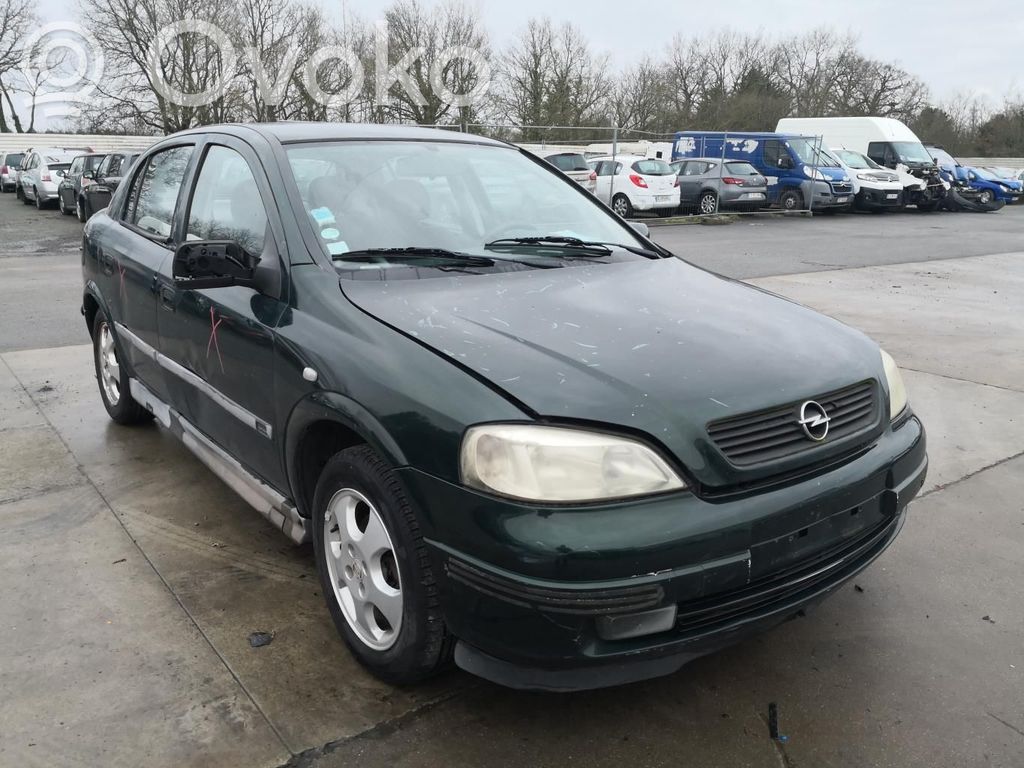 Opel Astra G Zacisk hamulcowy przedni 
