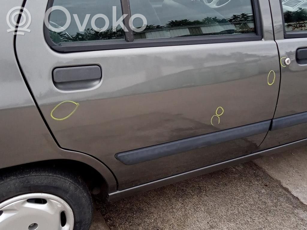 Renault Clio I Regulador manual de la ventanilla trasera 