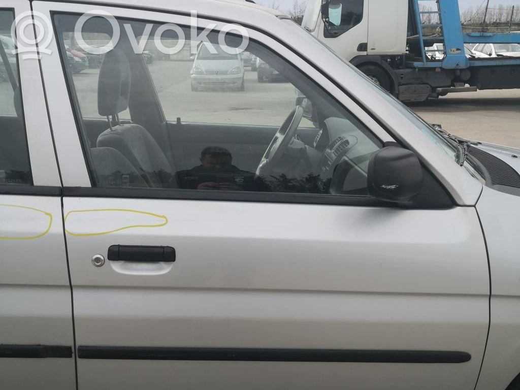Mazda Demio Front door 