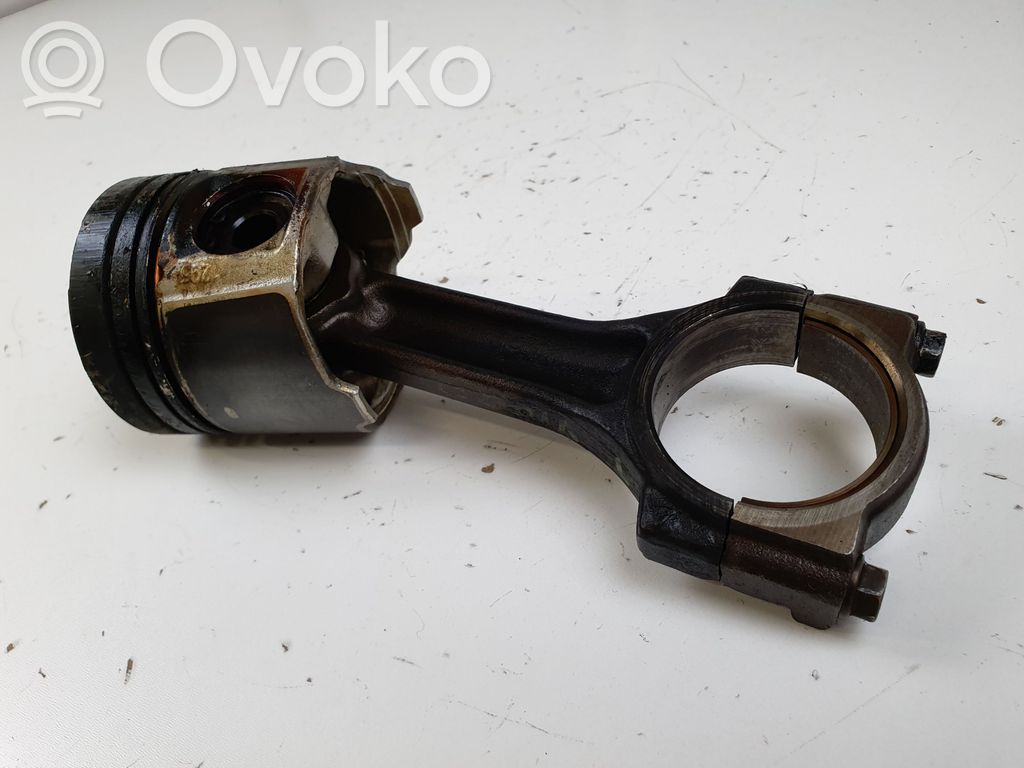 Piston with connecting rod