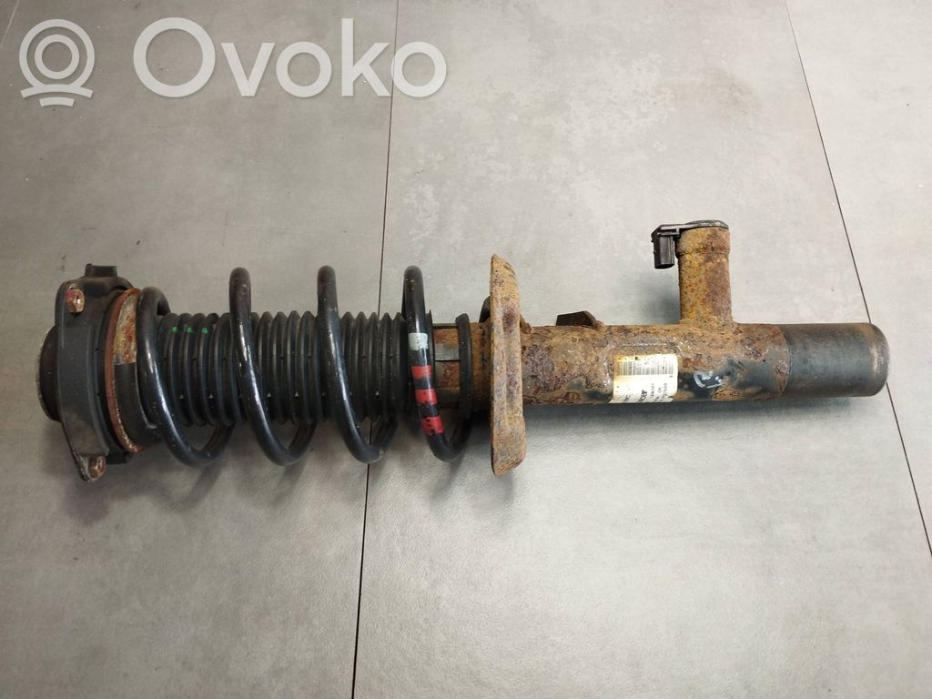 Volkswagen Scirocco Amortyzator osi przedniej ze sprężyną 