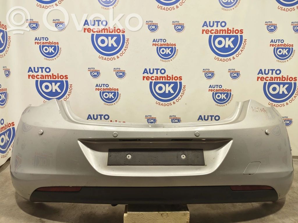 Opel Astra J Бампер 