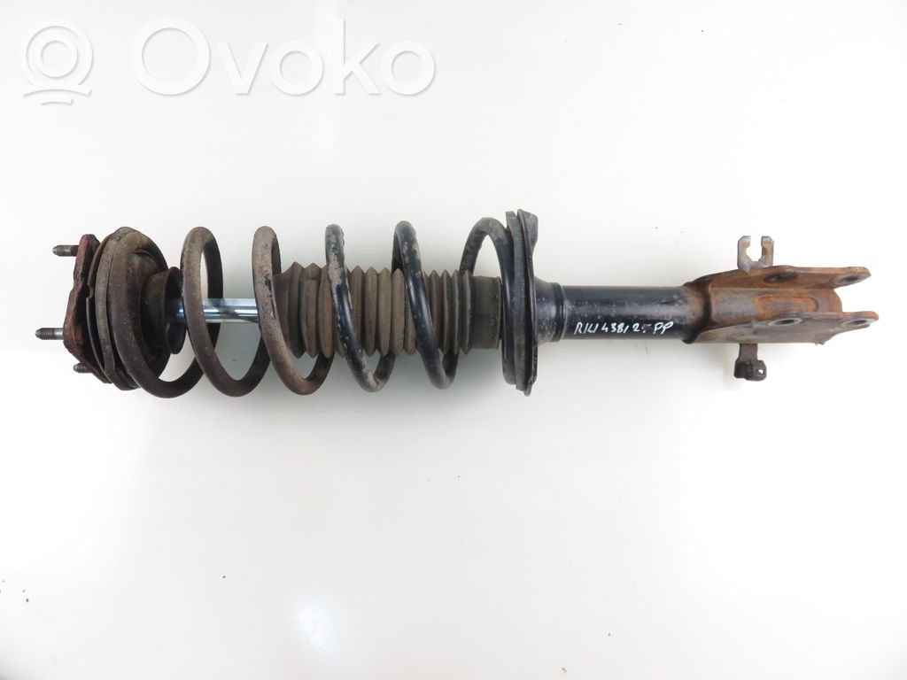 Front shock absorber with coil spring