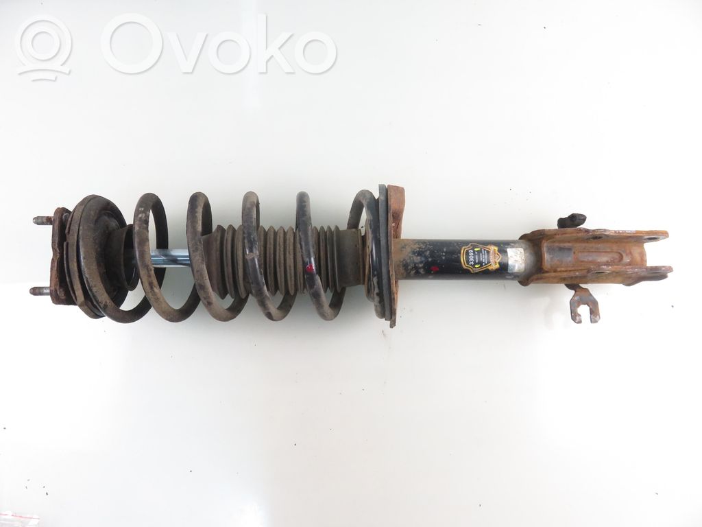 Front shock absorber with coil spring