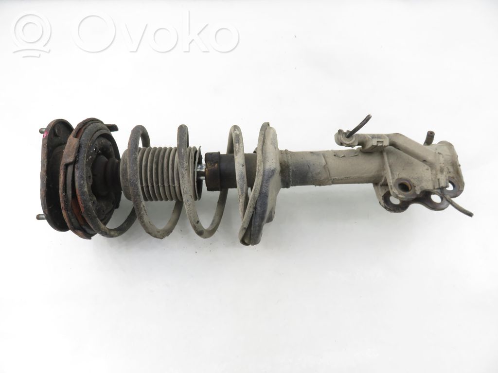 Front shock absorber with coil spring