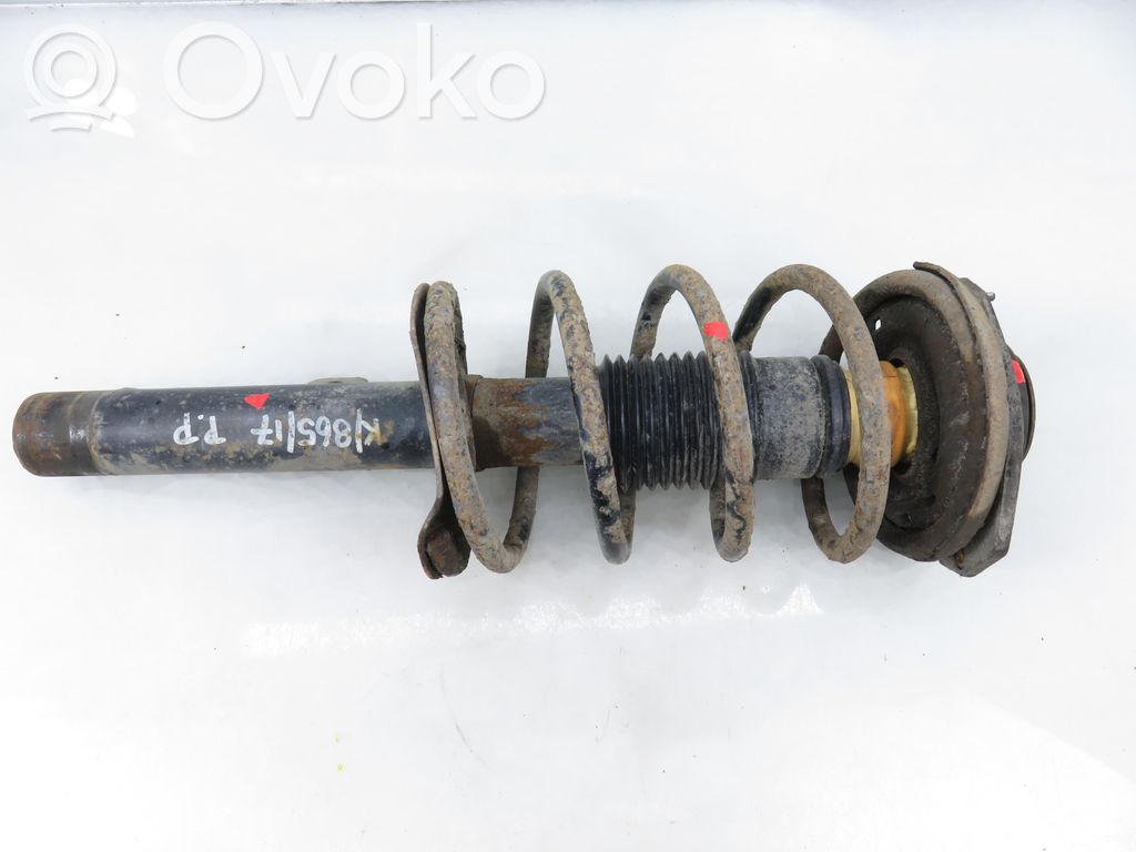 Front shock absorber with coil spring