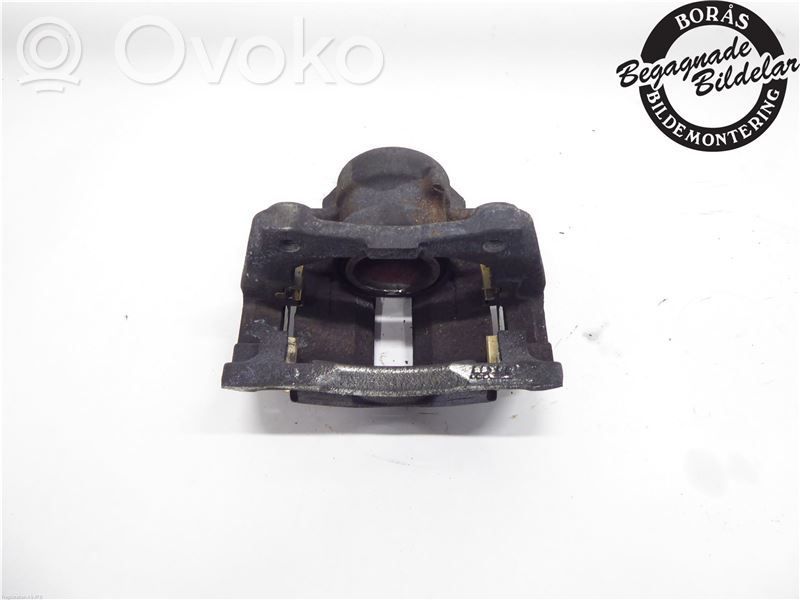 Nissan Note (E12) Front brake caliper 