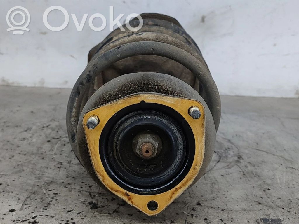 Nissan Almera N16 Amortyzator przedni 