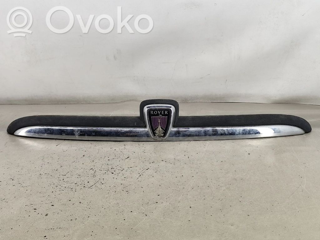 Tailgate/trunk side cover trim