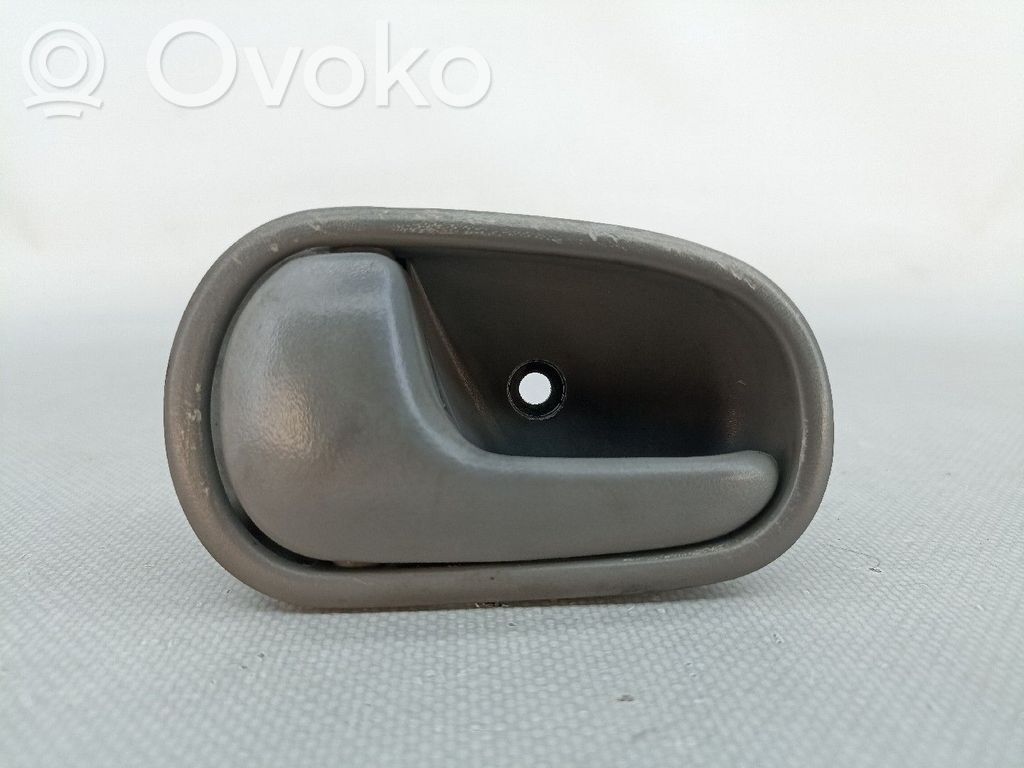 Manecilla interna puerta delantera   KD06159330