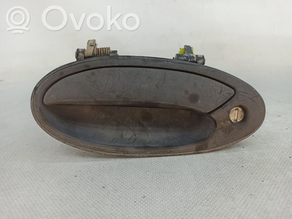 Mitsubishi Lancer Manecilla externa puerta delantera 