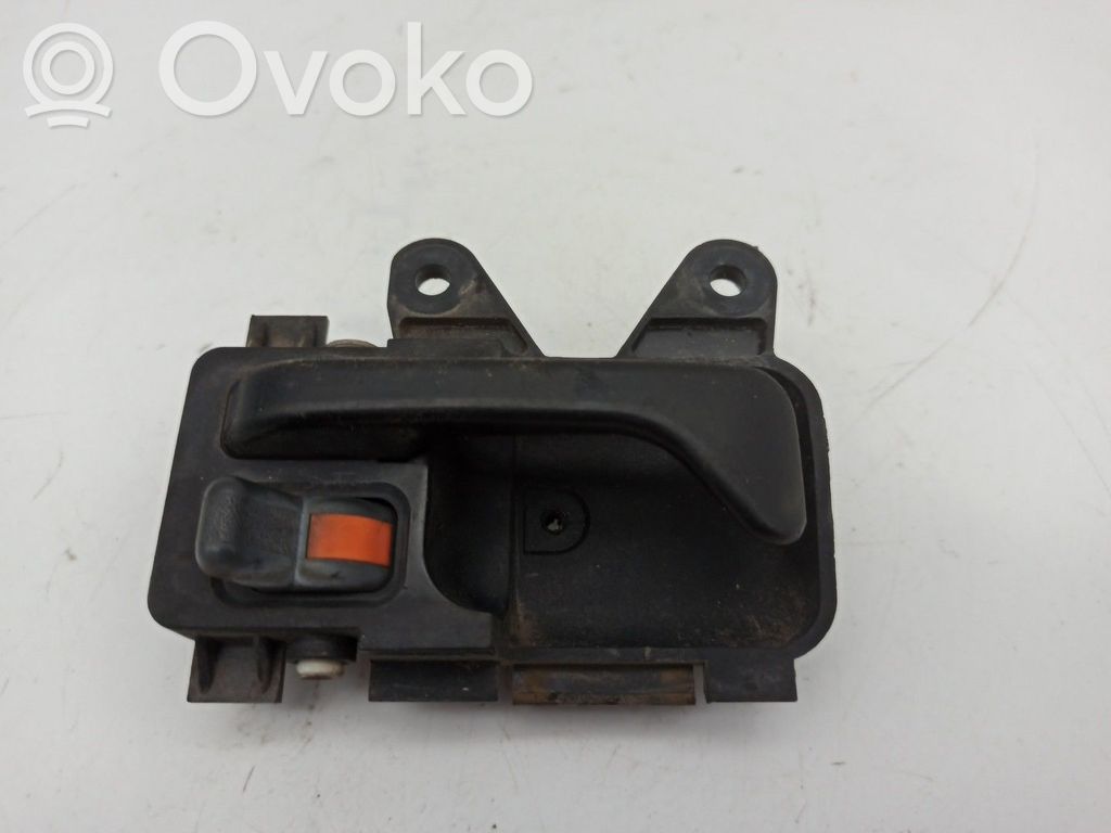 Support poignée extérieur de porte avant