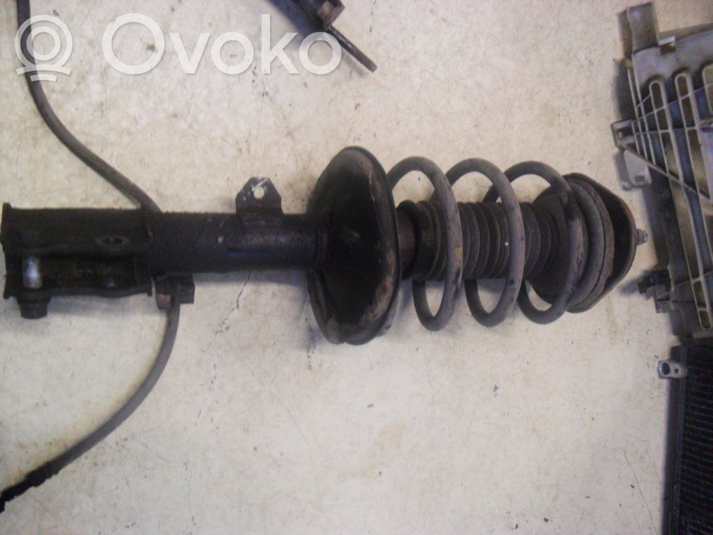 Front shock absorber with coil spring