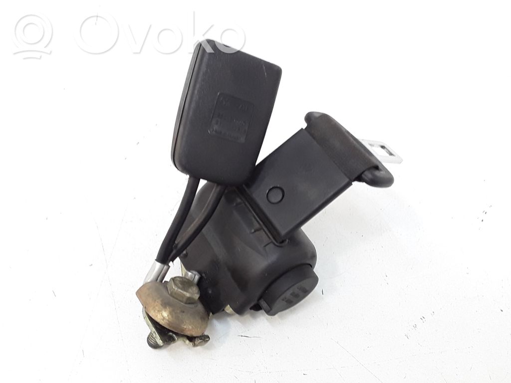 Volkswagen PASSAT B5 Hebilla del cinturón de seguridad trasero 