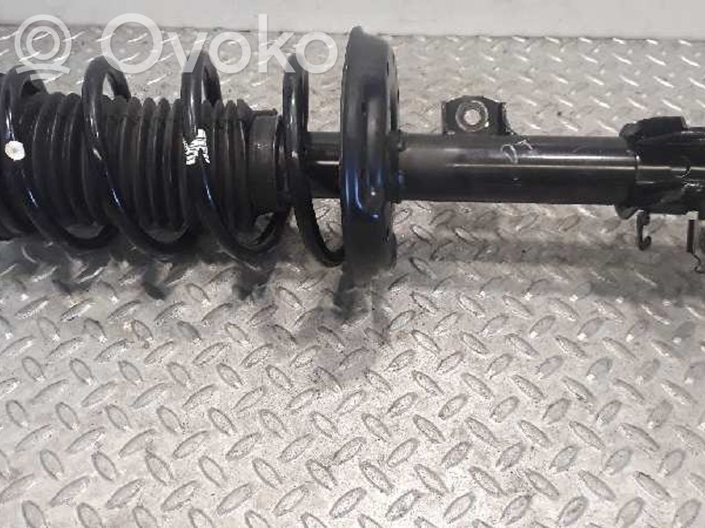 Opel Corsa D Amortyzator osi przedniej ze sprężyną 
