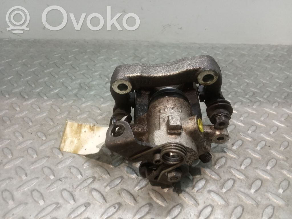 Peugeot 308 Mocowanie / Zacisk hamulca tylnego 