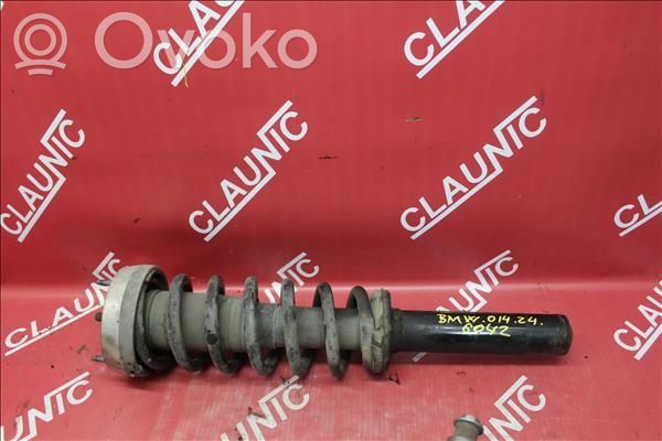 Front shock absorber with coil spring