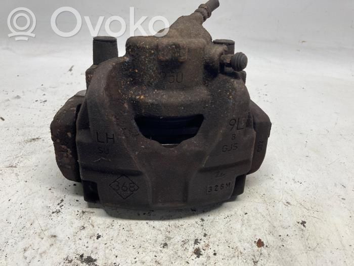 Renault Megane III Zacisk hamulcowy przedni 