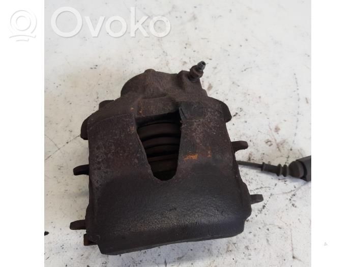 Skoda Fabia Mk2 (5J) Zacisk hamulcowy przedni 