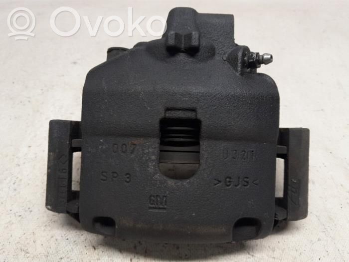 Opel Corsa E Zacisk hamulcowy przedni 