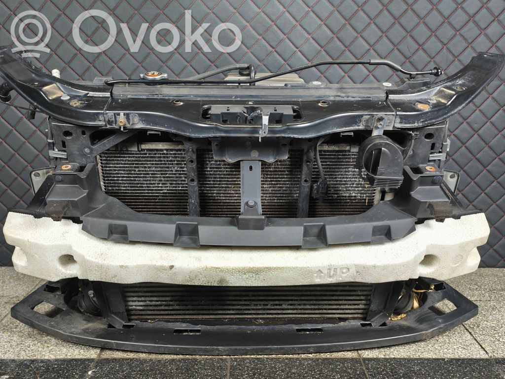 Radiator support slam panel