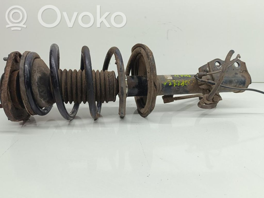 Toyota Corolla E120 E130 Priekšpusē amortizators 