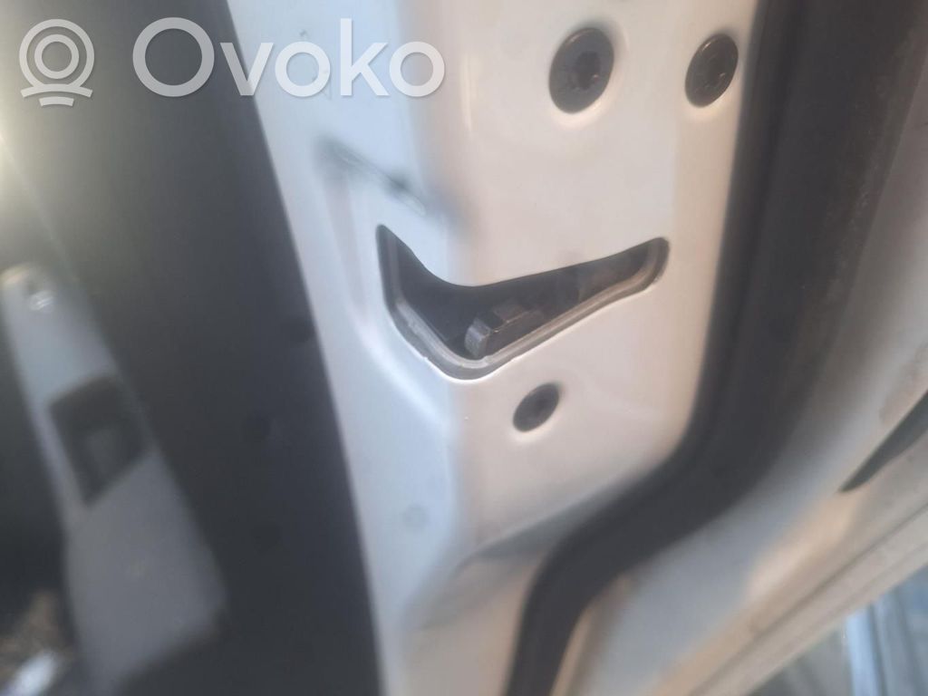 Cerradura de puerta trasera