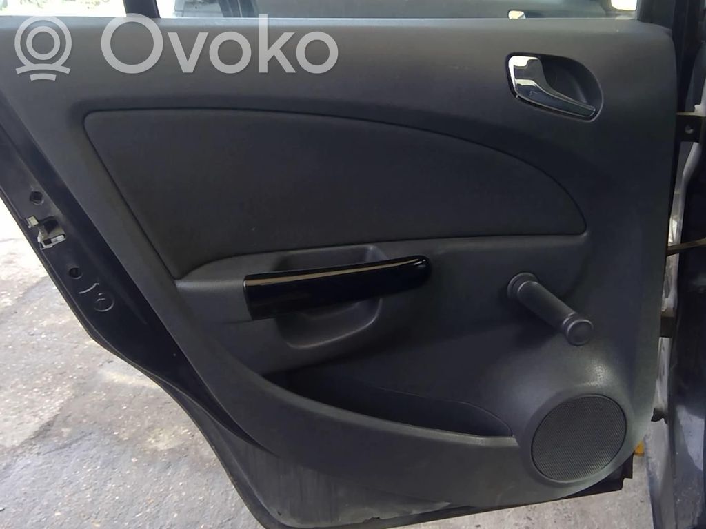 Opel Corsa D Apšuvums aizmugurējām durvīm 