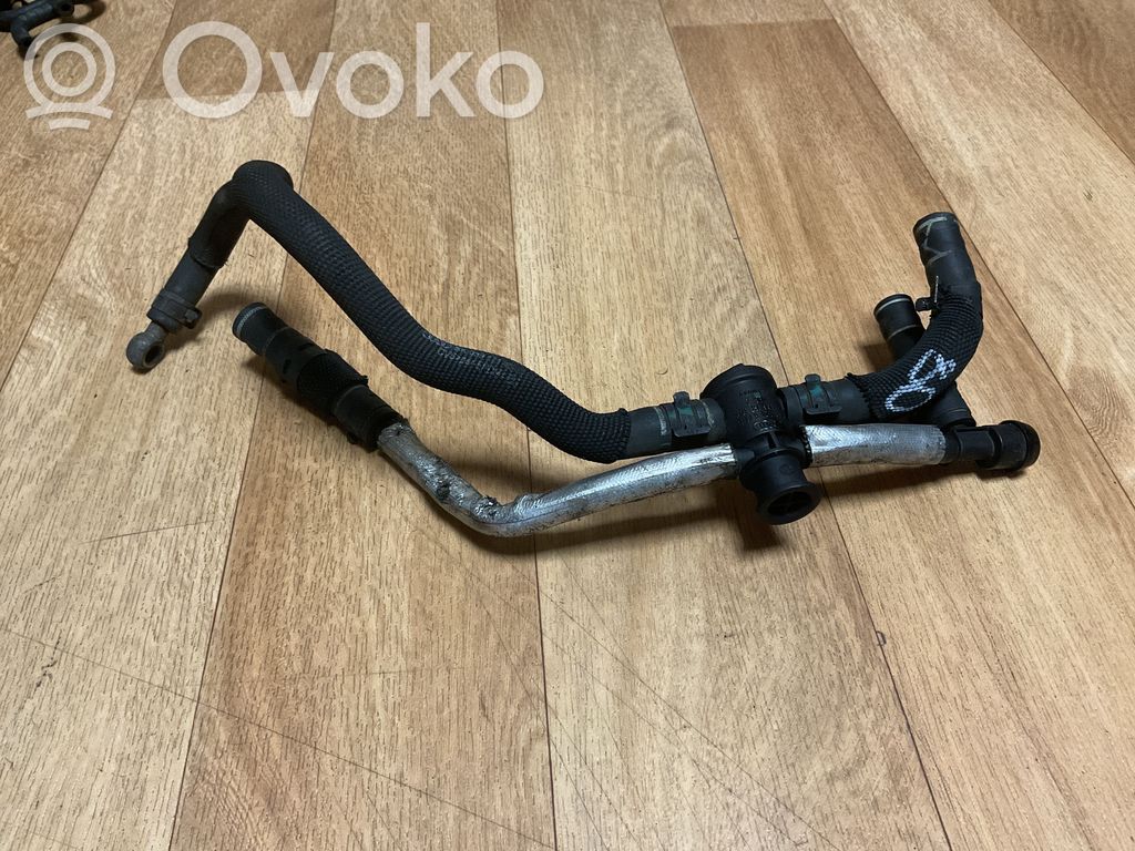 Volkswagen Touareg II Engine coolant pipe/hose 