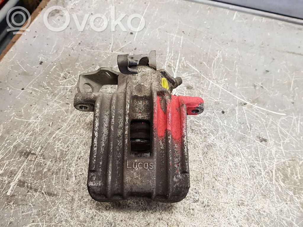 Volkswagen Golf IV Tylny zacisk hamulcowy 