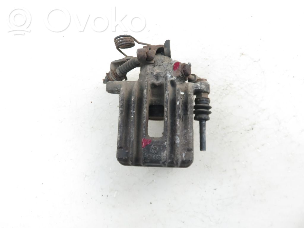 Volkswagen Golf IV Tylny zacisk hamulcowy 