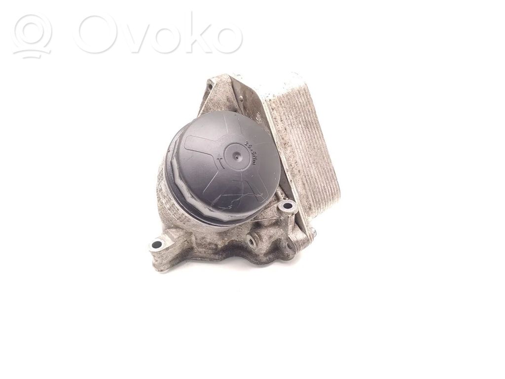 Oil filter mounting bracket   7516383,7570085,7573032,7576521