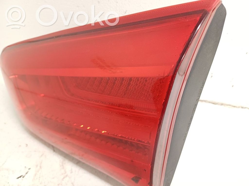 KIA Sportage Galinis žibintas dangtyje 