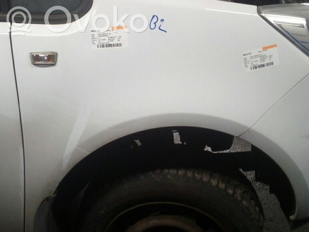 Opel Meriva B Błotnik przedni 