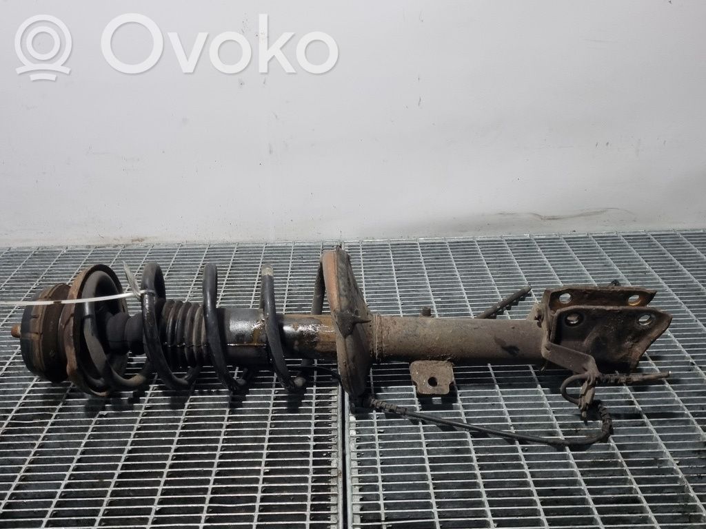 Front shock absorber with coil spring