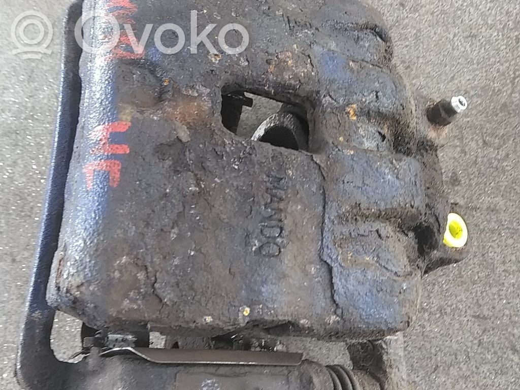Opel Insignia A Zacisk hamulcowy przedni 