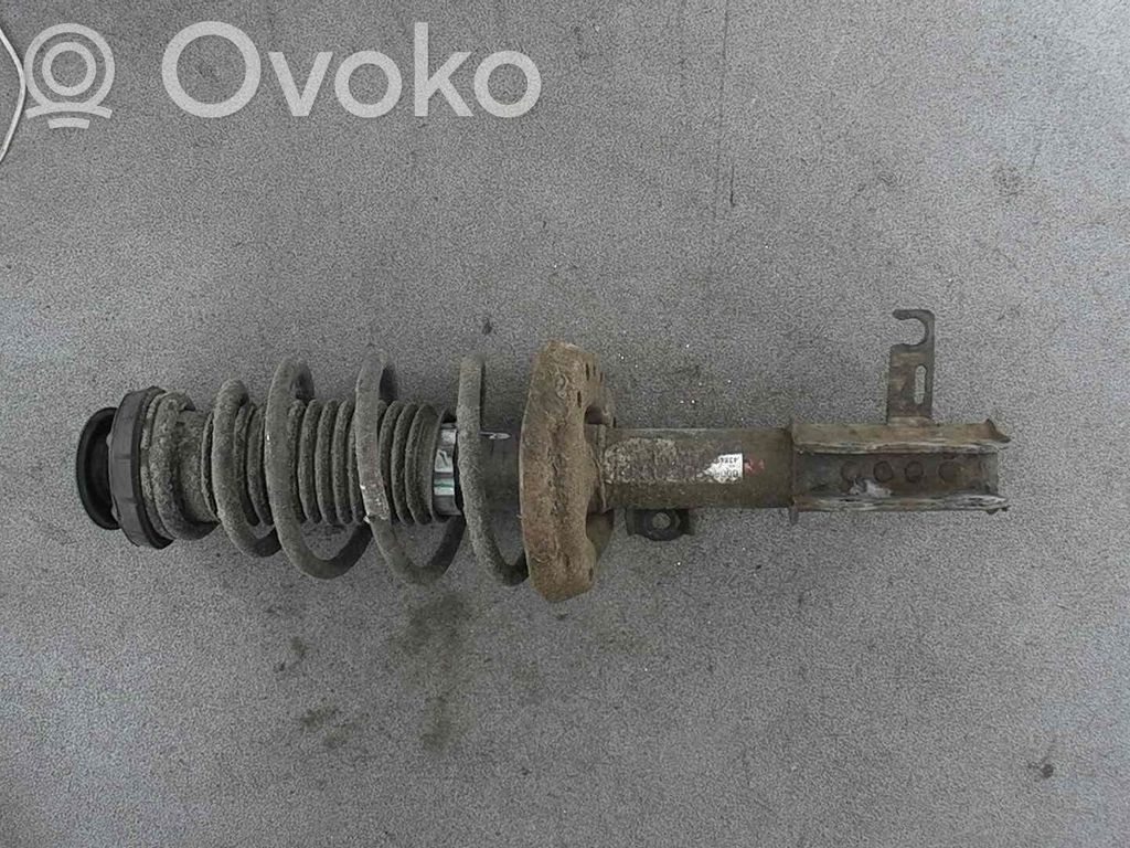 Opel Astra J Amortyzator osi przedniej ze sprężyną 