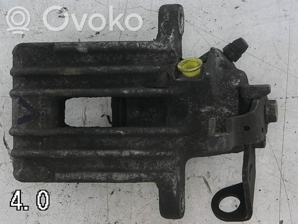 Volkswagen Golf IV Tylny zacisk hamulcowy 