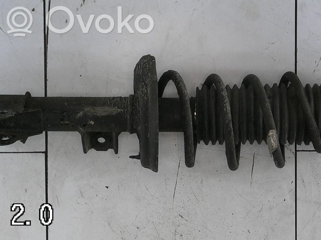Opel Karl Etuiskunvaimennin kierrejousella 