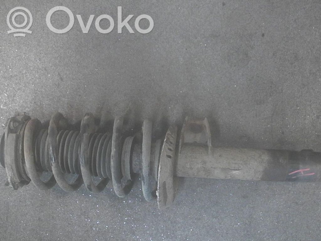 Amortyzator osi przedniej ze sprężyną   1T0413031HQ,1K0411105EF